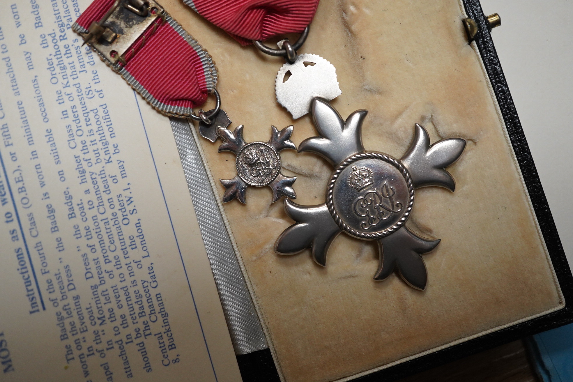 An MBE for Archibald Lees with miniature and an Imperial Service Medal for Thomas Lees, a silver coaster and silver match case with coronet over ‘E’ and ‘Holyrood 1925’ to reverse